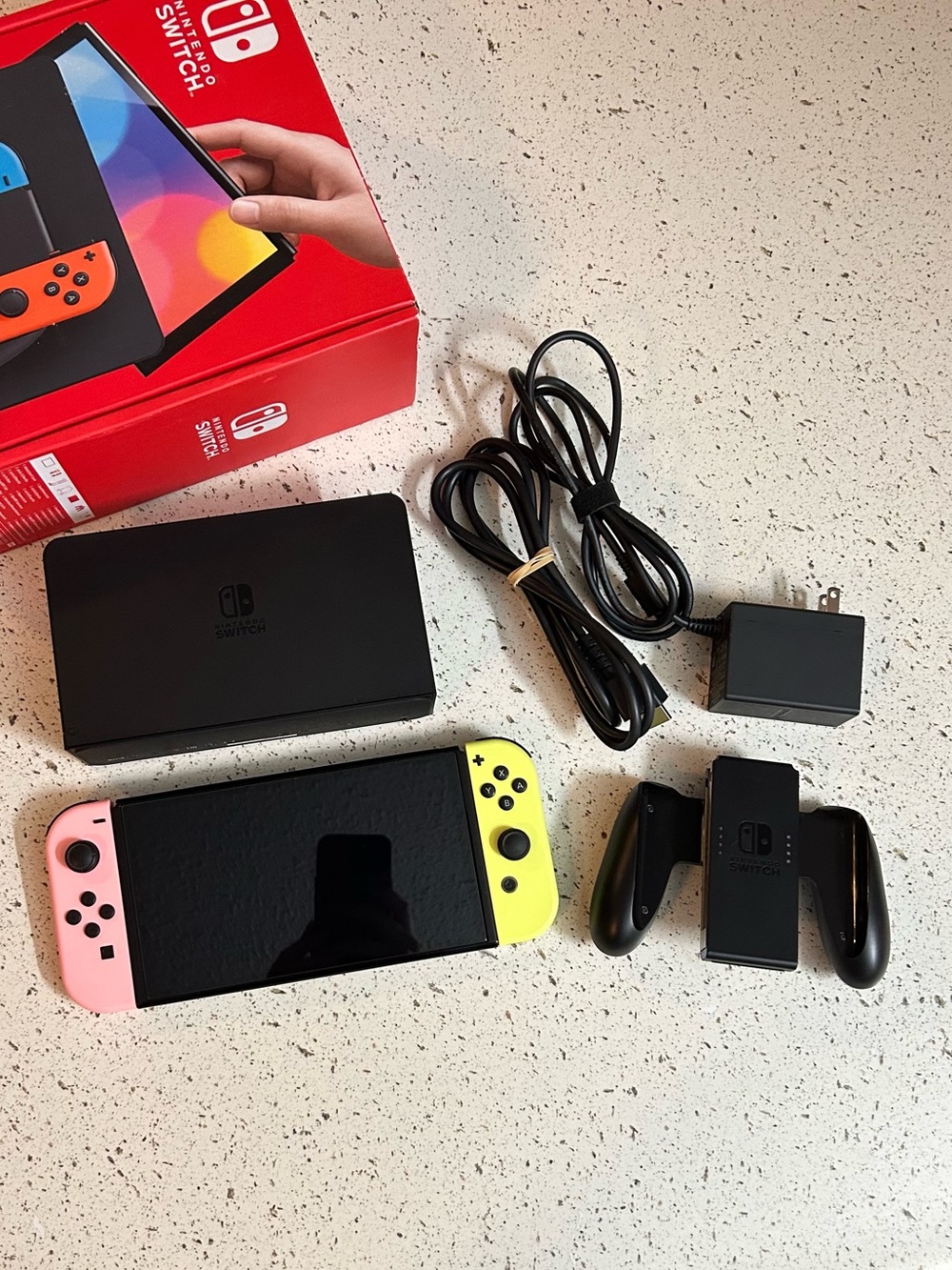 Nintendo Switch with Pastel Pink and Yellow Joycons + Accessories